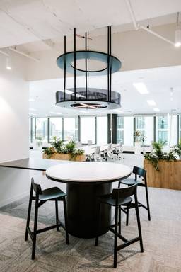 Modern Workspace With Fitout Of Office Furniture And Plants